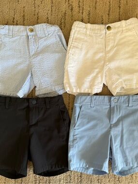 Janie and Jack Four-Pack Shorts in Light Blue Stripe, White, Black, and Sky Blue